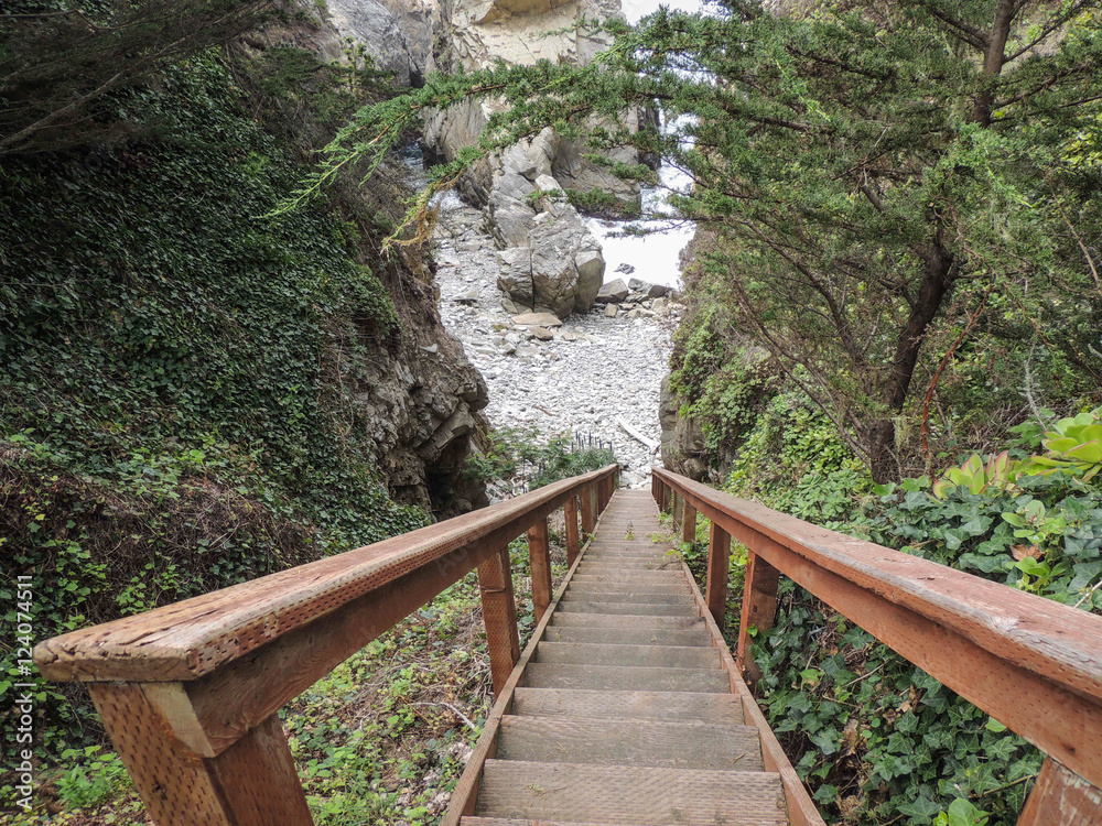 Fototapeta premium Wooden stairs down to the beach