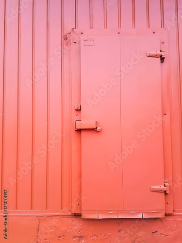 orange color door on orange color wall