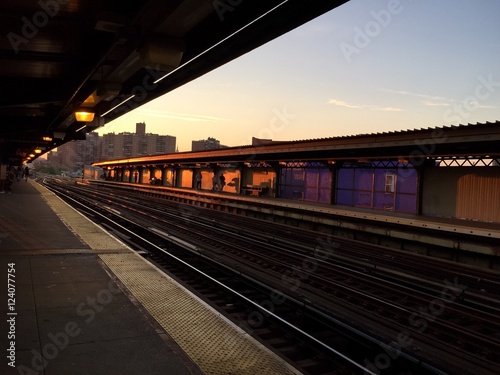 subway platform in perspective view with sunset sky, Flushing ave, Brooklyn, New York