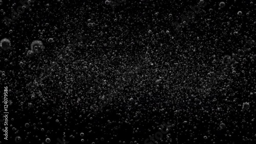 A black background of soda bubble fizz with last 10 seconds loop at end.