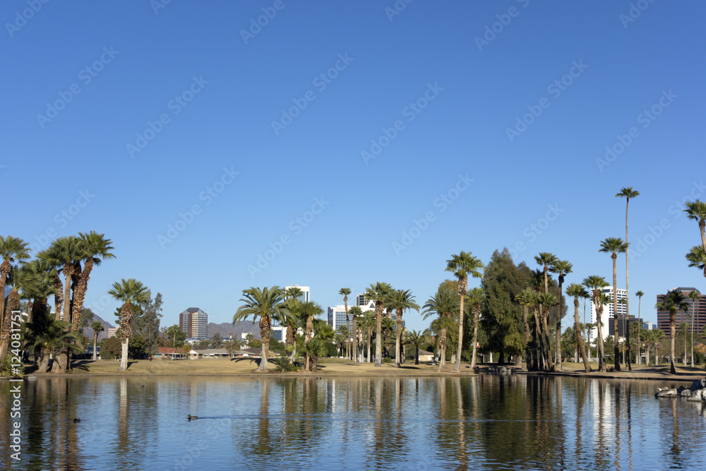 Bright blue winter sky on the lake in Encanto park located right in downtown of Phoenix Arizona; Copyspace