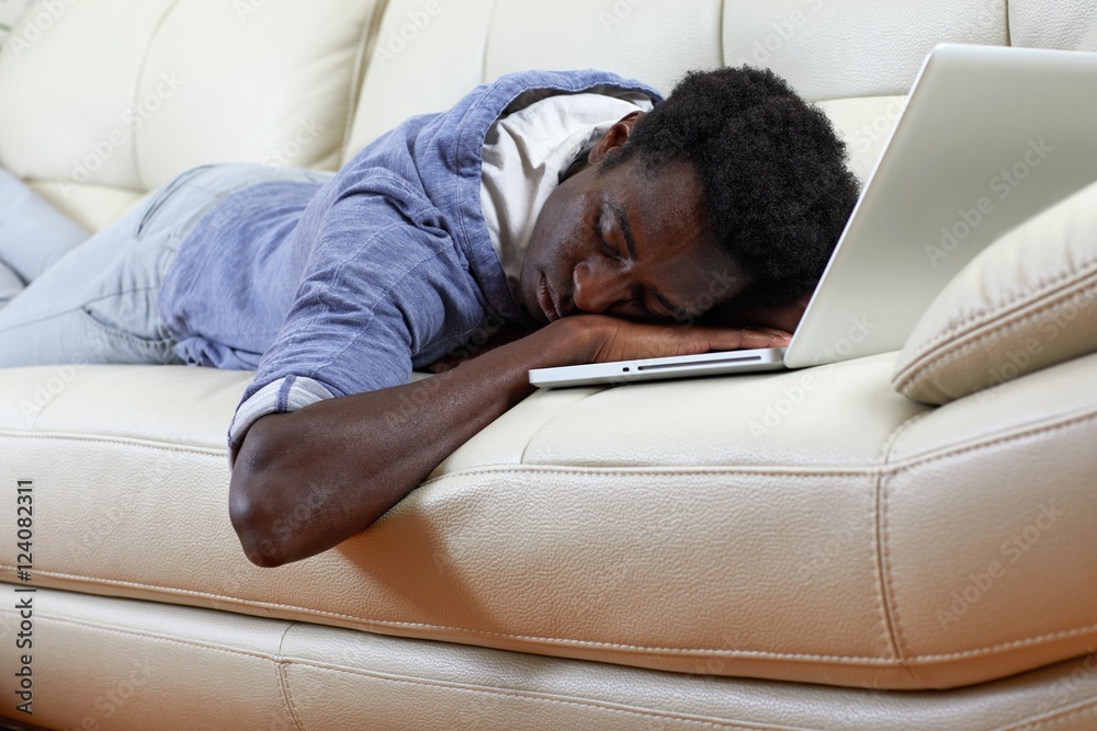 Fototapeta premium Sleeping Afro American man.