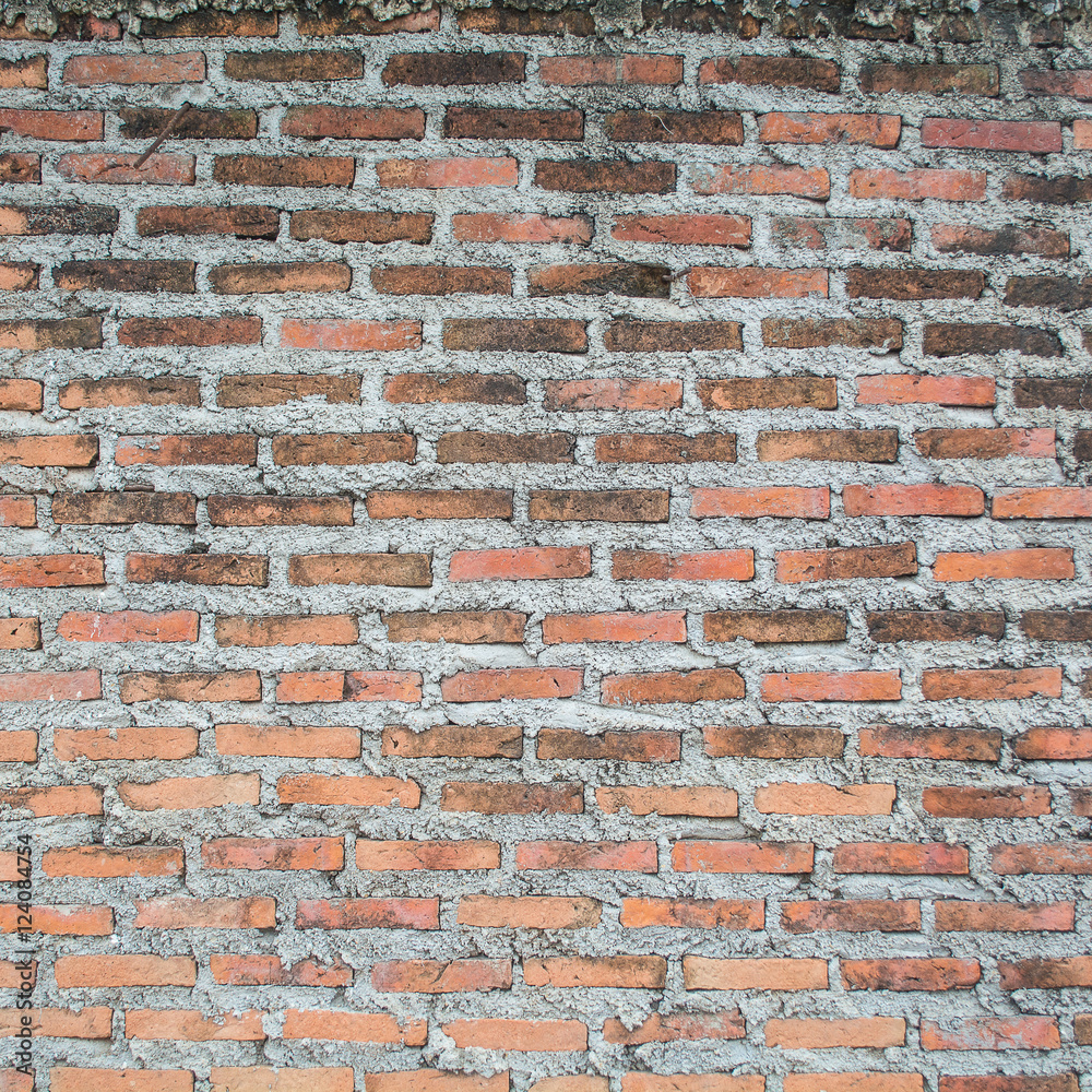Brown-black old brick wall pattern with grey cement. Brown-black old brick wall pattern with grey cement.