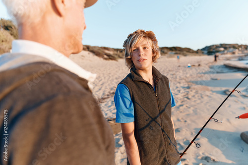 Teenage boy fishing at sea