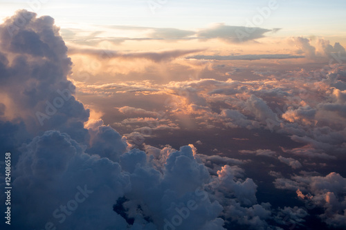 View of the clouds and airplane wing from the Inside