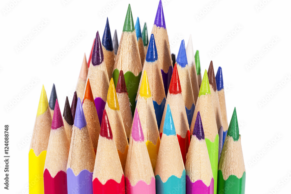 Chipped colored crayons on white background, close up Chipped colored crayons on white background, close up