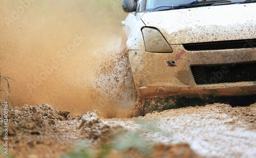 Rally car in muddy road © toa555