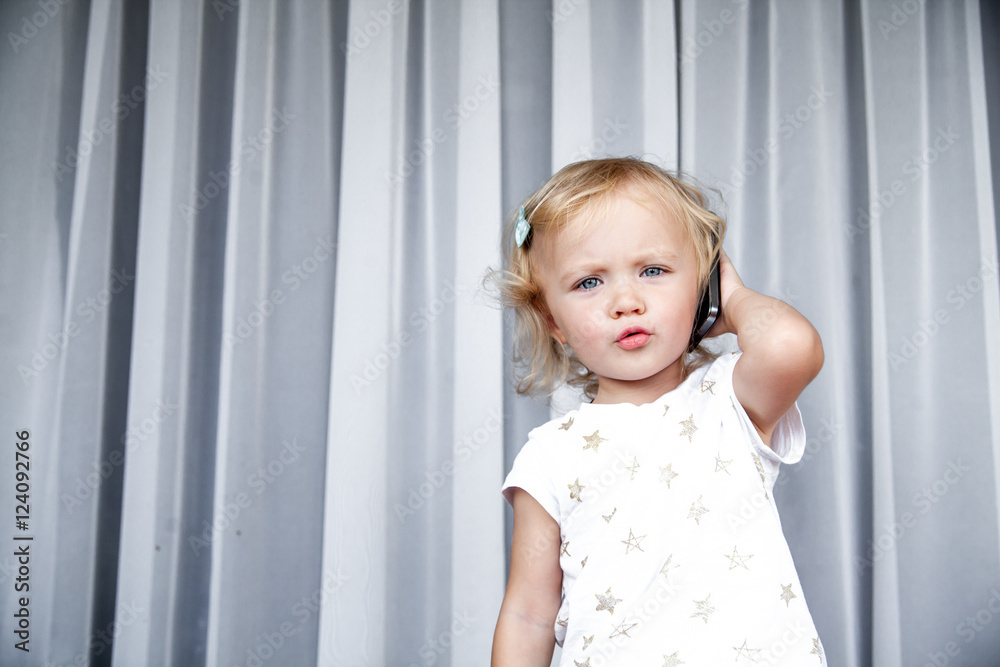 Little girl talking on mobile phone Little girl talking on mobile phone