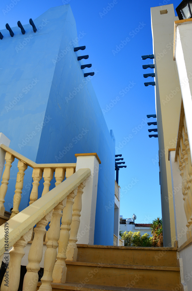 Classical Greek architecture on Cyprus: staircase, white and blue wall