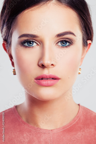 Beauty Portrait of a Beautiful Woman with Fashion Makeup. Perfec