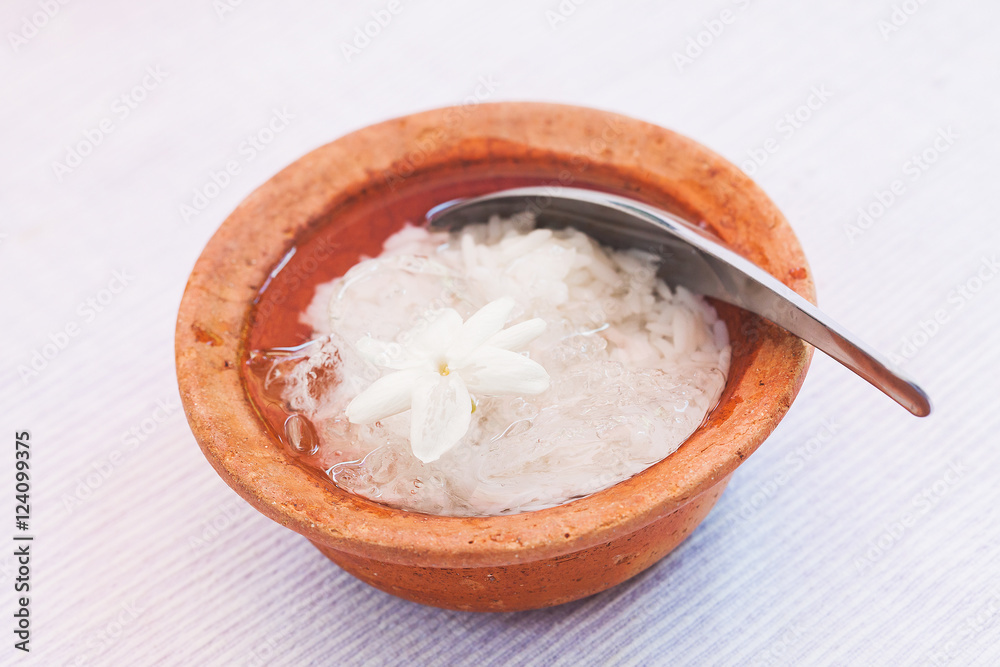 rice in ice water with side dishes such deep fried pork, onion, rice in ice water with side dishes such deep fried pork, onion,