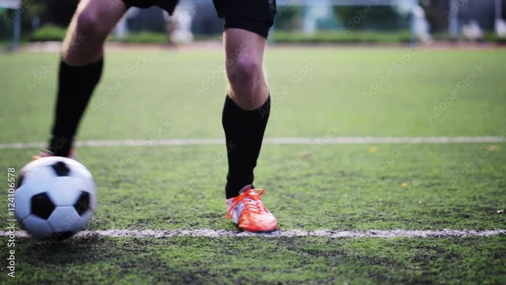 soccer player playing with ball on field soccer player playing with ball on field