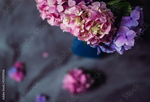 Look from above at glorious hydrangeas standing in the high vase