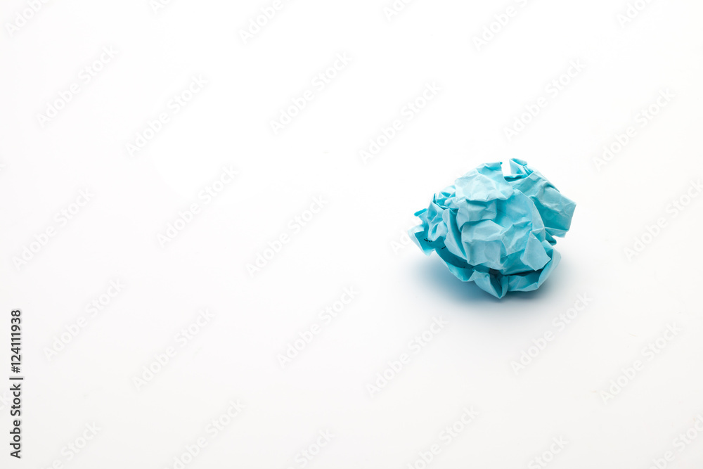 close-up of crumpled paper ball, blue wadded paper close-up of crumpled paper ball, blue wadded paper