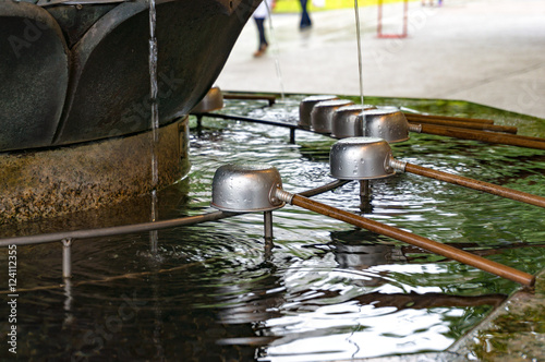 Chozuya purification fountain. Japanese Shinto shrine © Olga K