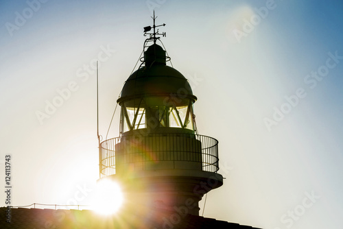 Lighthouse and sunbeams