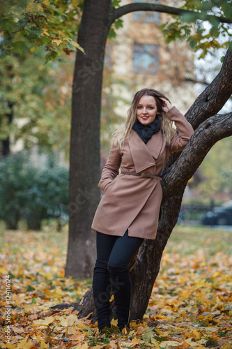 Beautiful girl in autumn Park