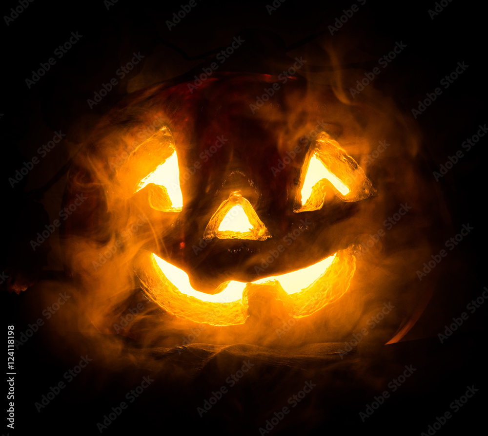 Fototapeta premium Halloween - old jack-o-lantern on black background