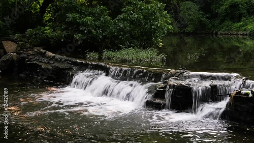 Beargrass Creek in Louisville, small waterfall in Cherokee Park.