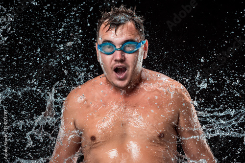 The water splash on male face