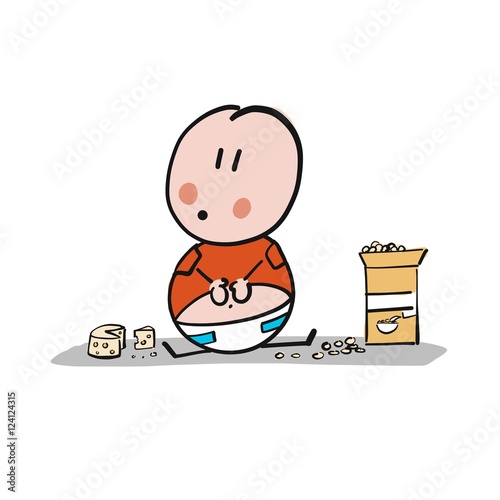 Bebé sentado en el suelo comiendo