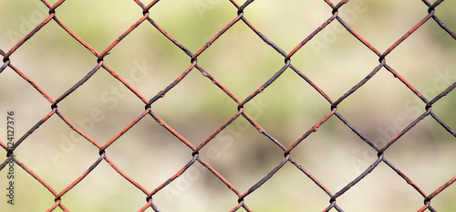 Website banner of an old steel wire mesh fence