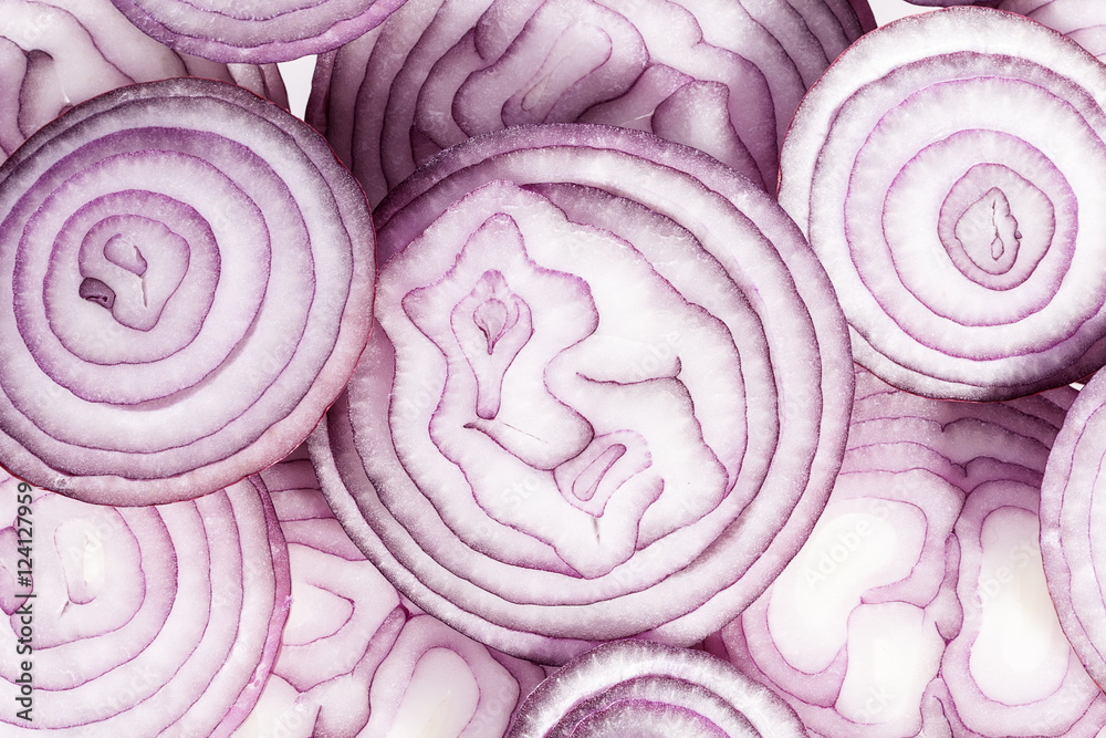 Background of red onion slices, close up Background of red onion slices, close up