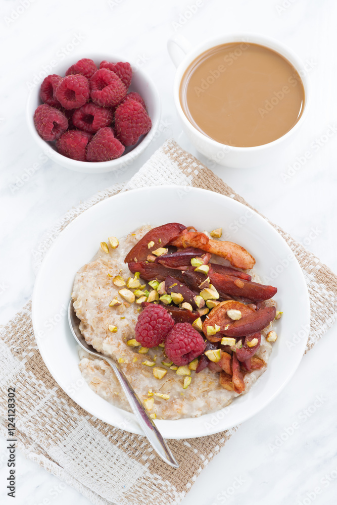 oatmeal with baked fruit, coffee with milk for breakfast oatmeal with baked fruit, coffee with milk for breakfast