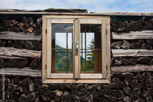 Window in a wood stack