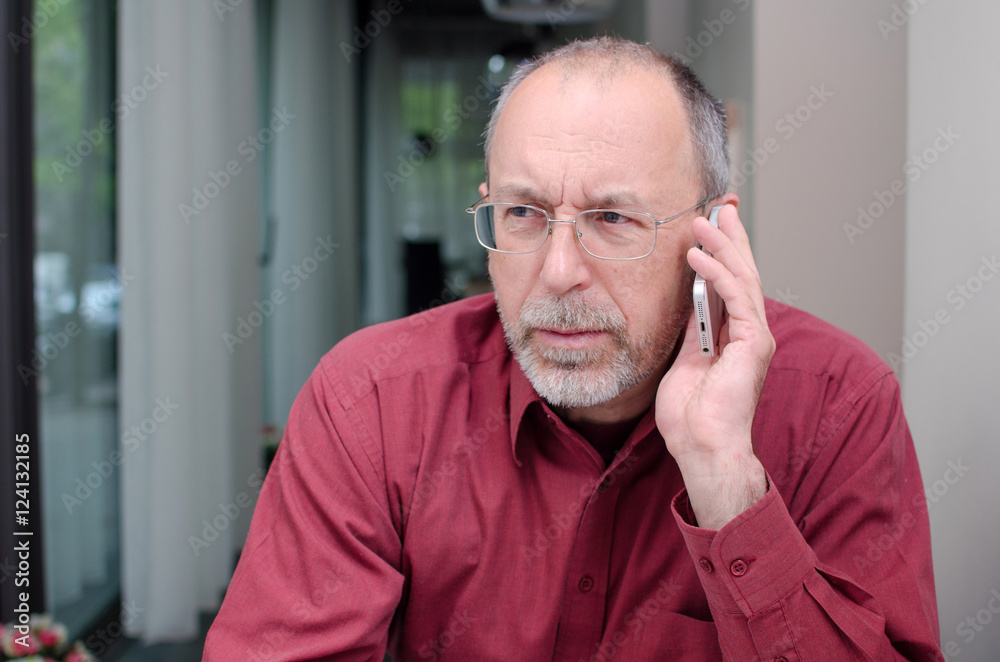 Aged man with the phone Aged man with the phone