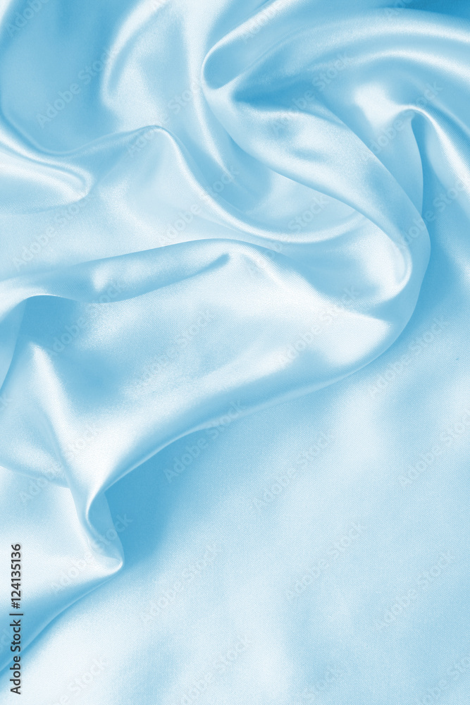 Obraz premium Smooth elegant blue silk or satin as background
