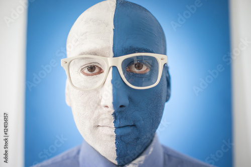 Blue and white face portait photo of a man © Jasmin Merdan