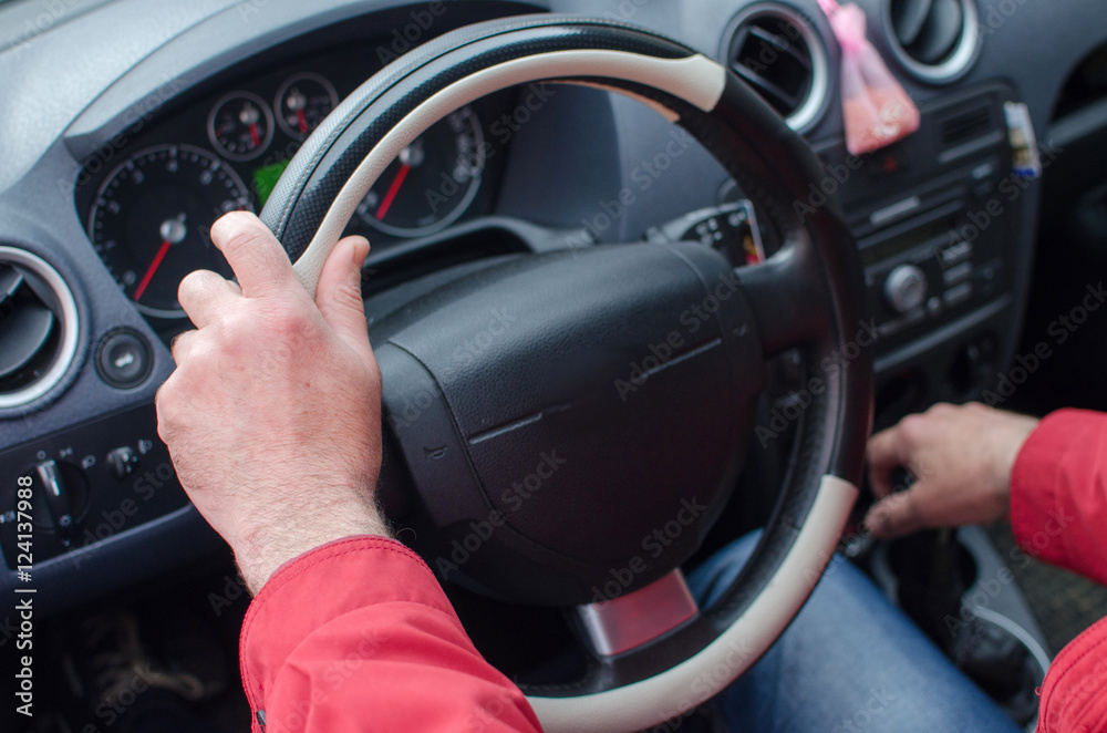 Aged man in the car