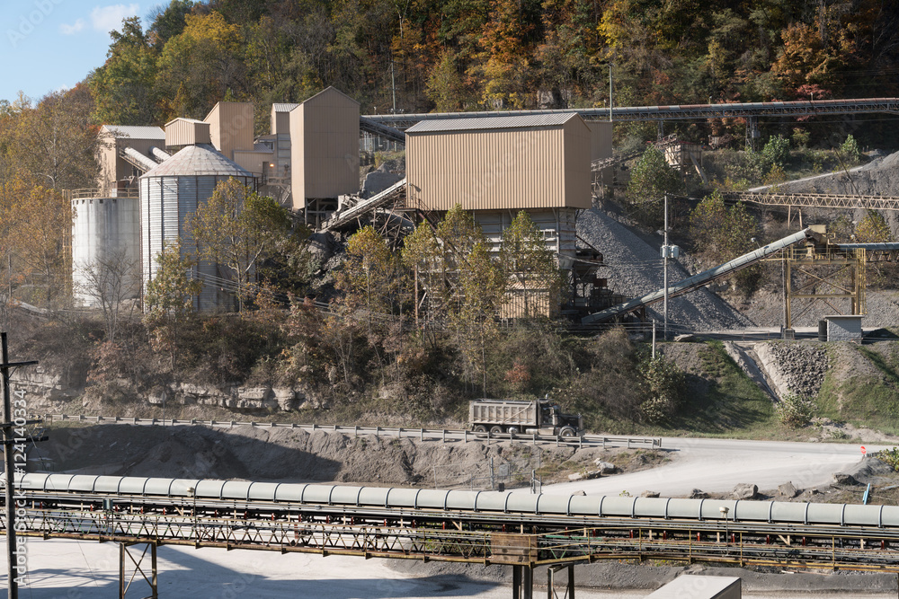 Limestone or crushed stone factory in wooded valley