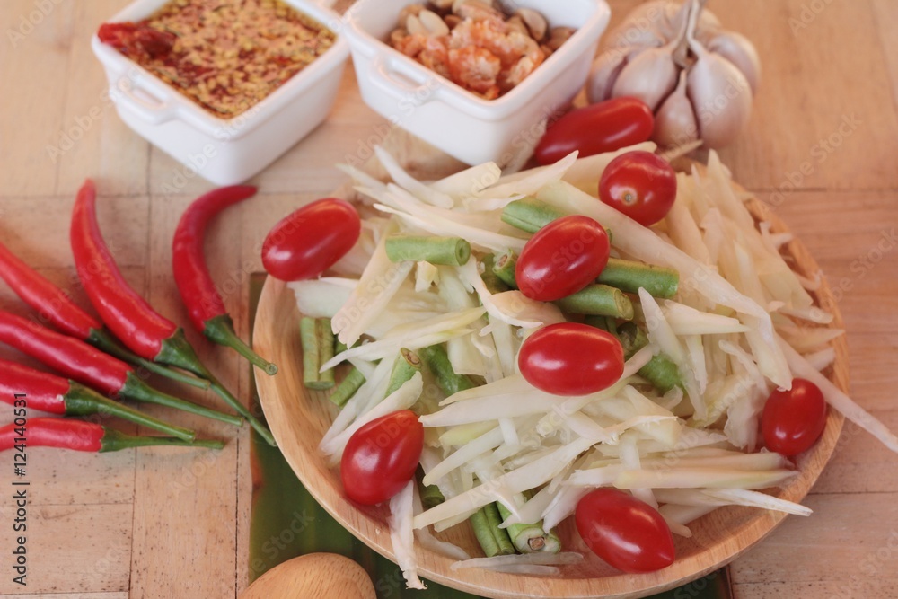 Spicy papaya salad is delicious ,thai food. Spicy papaya salad is delicious ,thai food.