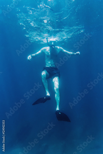 Man diving with splash