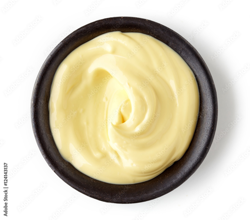 Mayonnaise in round dish on white background Mayonnaise in round dish on white background