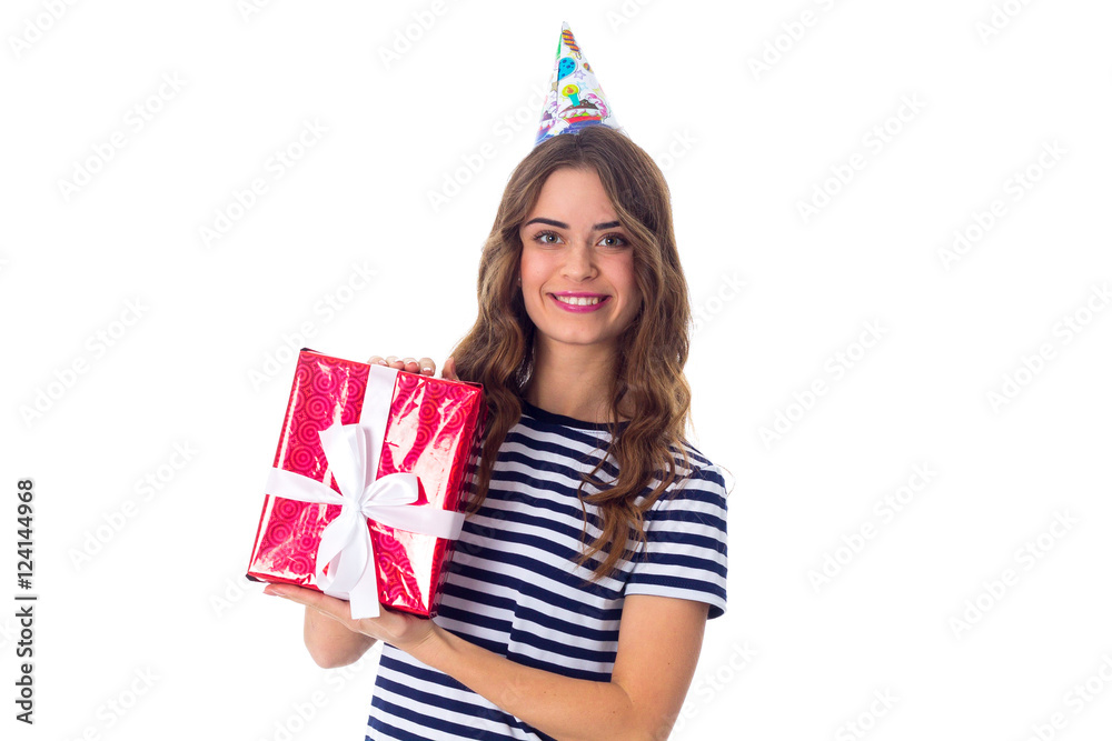 Woman in celebration cap holding a present Woman in celebration cap holding a present
