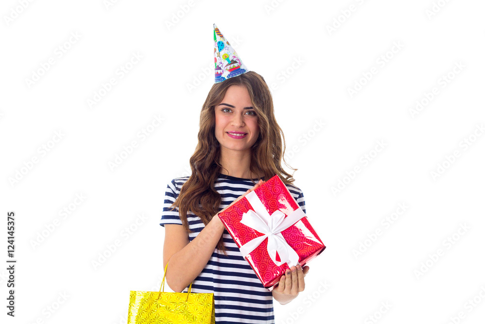 Woman in celebration cap holding presents Woman in celebration cap holding presents