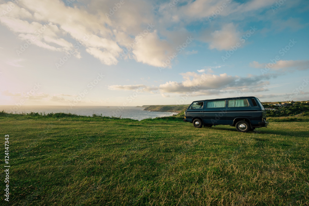 Old vintage van parking at the coastline of Cornwall, England