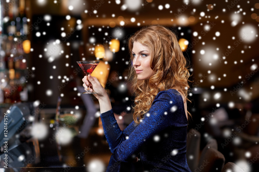 glamorous woman with cocktail at night club or bar glamorous woman with cocktail at night club or bar