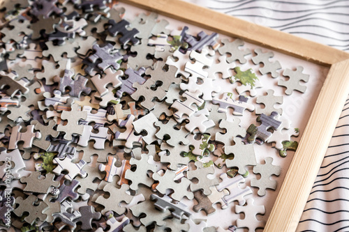 heap of paper jigsaw puzzle for creativity ideas concept