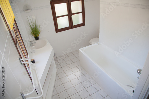 Modern white Bathroom interior in a bright house