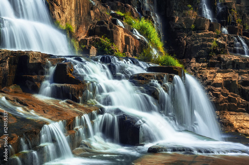 Tropical rainforest landscape with flowing Pongour waterfall. Da Lat, Vietnam