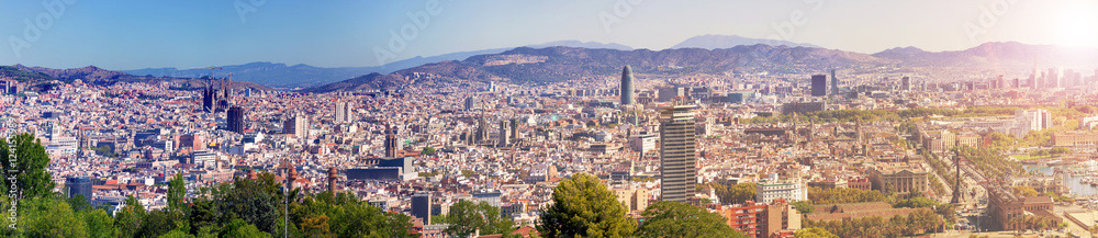 Panoramic Cityscape of the whole city of Barcelona from the Montjuic mountain. Aerial view. Spain.