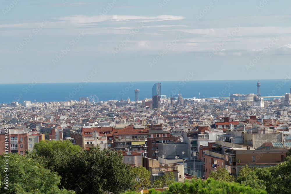 Barcelona, Spain panoramic view from Nature Square at Park Guell Monumental Zone.
The public park designed by Antoni Gaudi offers a wide view of Barcelona City.

