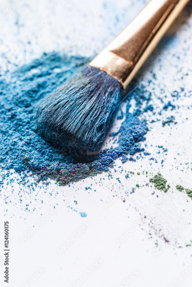 Macro photo of eye shadow with brush on white background Macro photo of eye shadow with brush on white background