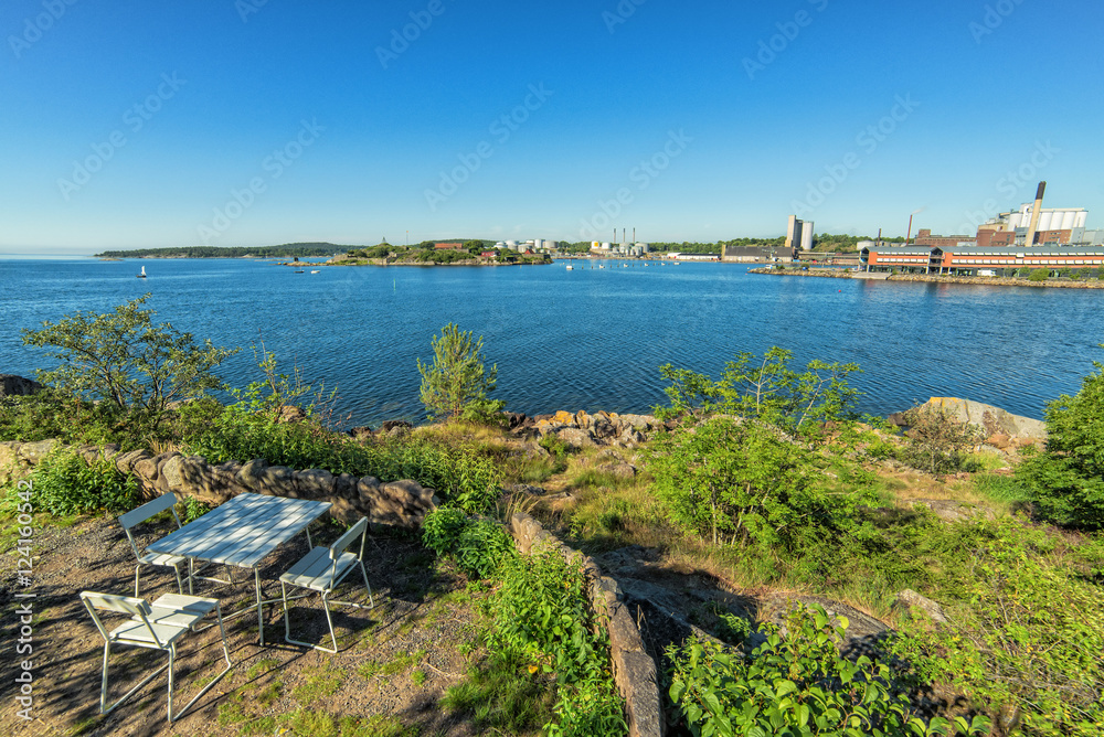 Fototapeta premium Coastal rest place with city bay view