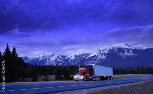 Semi truck on mountain highway, Alberta, Canada