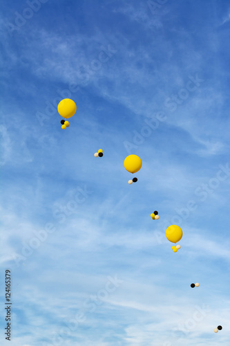 Helium balloons in the blue sky